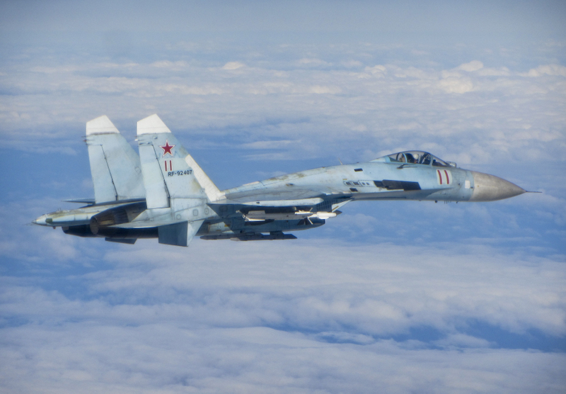 Illustration for article titled Photos of NATO fighters intercepting fully armed Russian jets